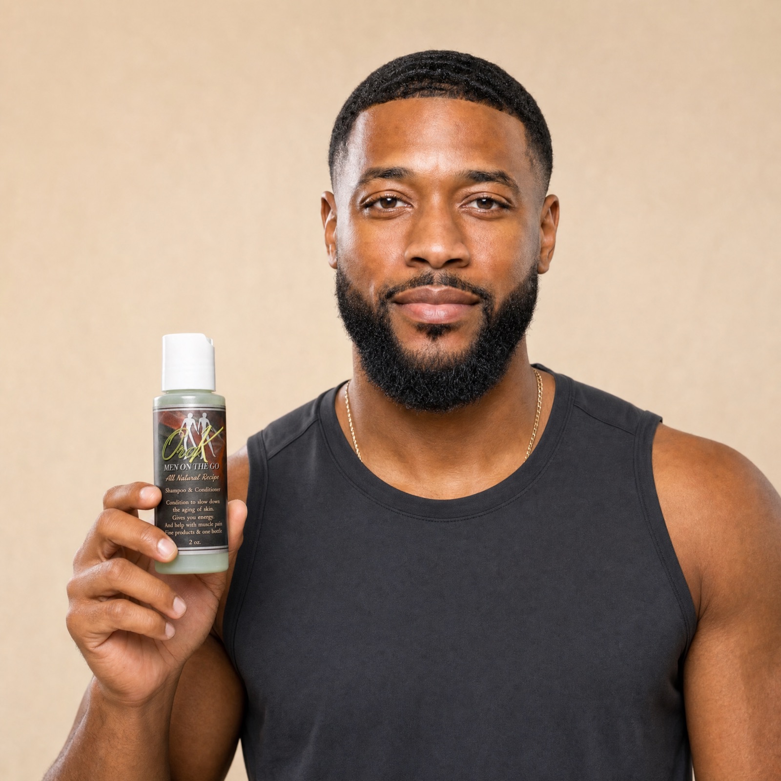A man holding a bottle of Ora K Men on the Go